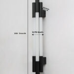 Black vertical LED wall light with multiple white diffusers and slim modern design