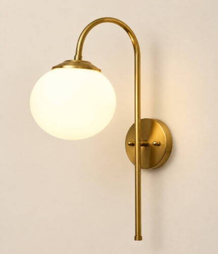 Gold finish wall light with Round White Glass globe and curved arm for modern home decor