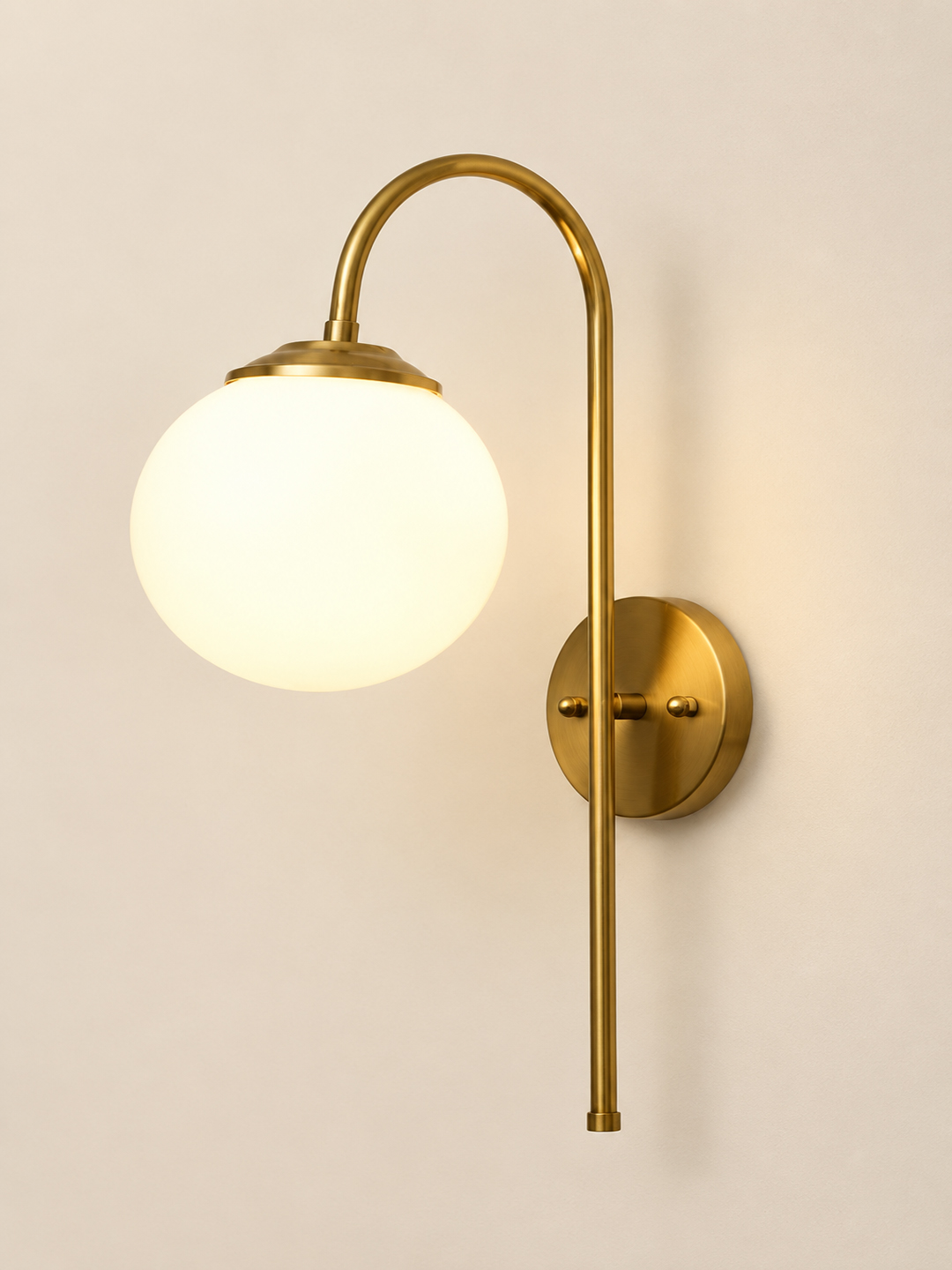 Wall Light Gold Finish with Globe Milky White Glass Gold finish wall light with Round White Glass globe and curved arm for modern home decor