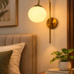 Gold finish wall light with Round White Glass globe and curved arm for modern home decor