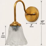 Flower Glass Wall Lamp with antique brass finish and decorative clear floral glass shade.