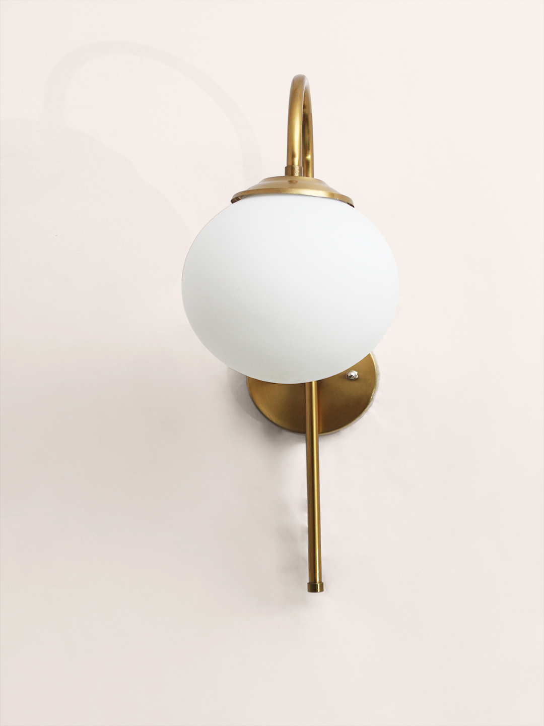 Wall Light Gold Finish with Globe Milky White Glass Gold finish wall light with Round White Glass globe and curved arm for modern home decor